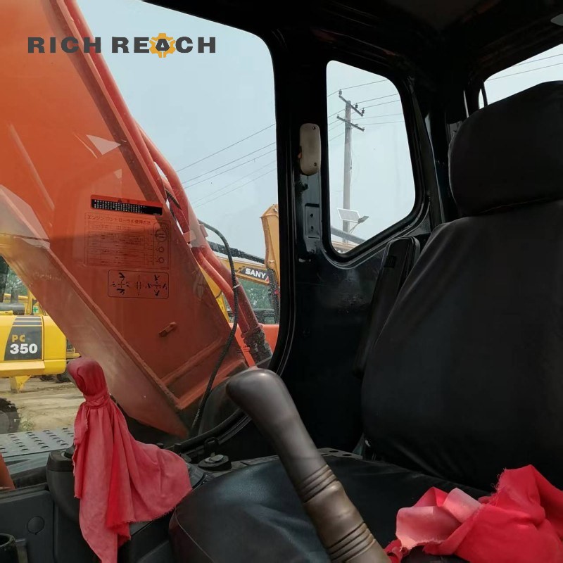 Cab interior of a 2023 Hitachi ZX160 excavator, low hours, priced at $29,300